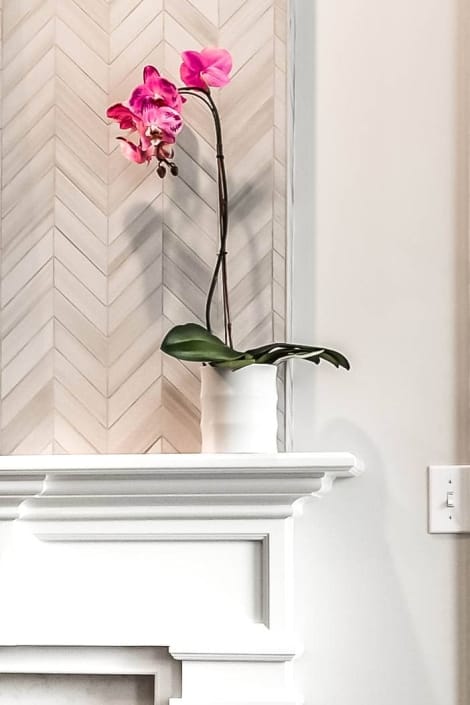 Custom fireplace update with Forshaw mantle and MSI chevron tile