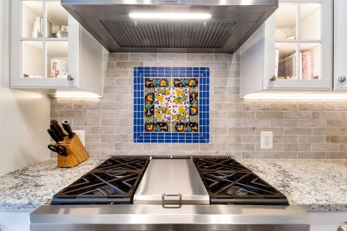 kitchen remodeling, Alexandria, VA with customer provided inset accented by Dal Tile blue deco tiles for focal point