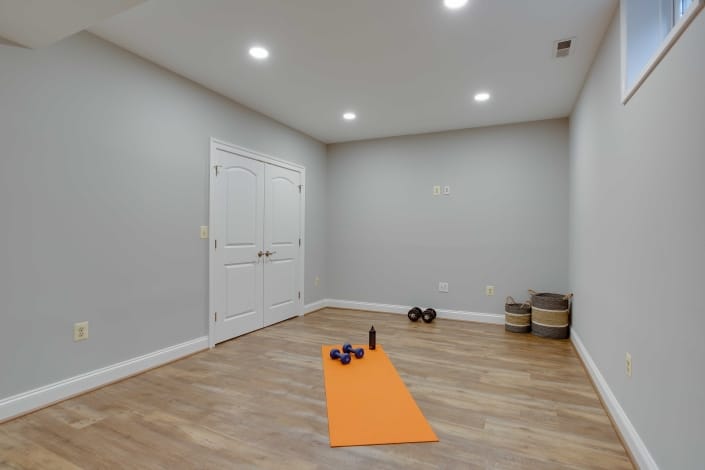 Basement remodeling with Luxury Vinyl Plank flooring by Happy Feet, Alexandria, VA