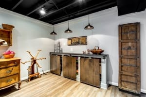 Custom remodeling, Herndon, VA, basement with custom adjustable pull out table sliding doors