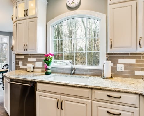 Kitchen Remodeling, Springfield, VA with custom Anderson arch window, glass backsplash and Cambria Berwin countertops