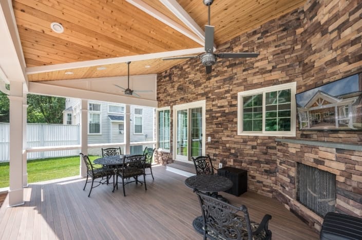 Springfield addition, outdoor patio with fireplace and TV area
