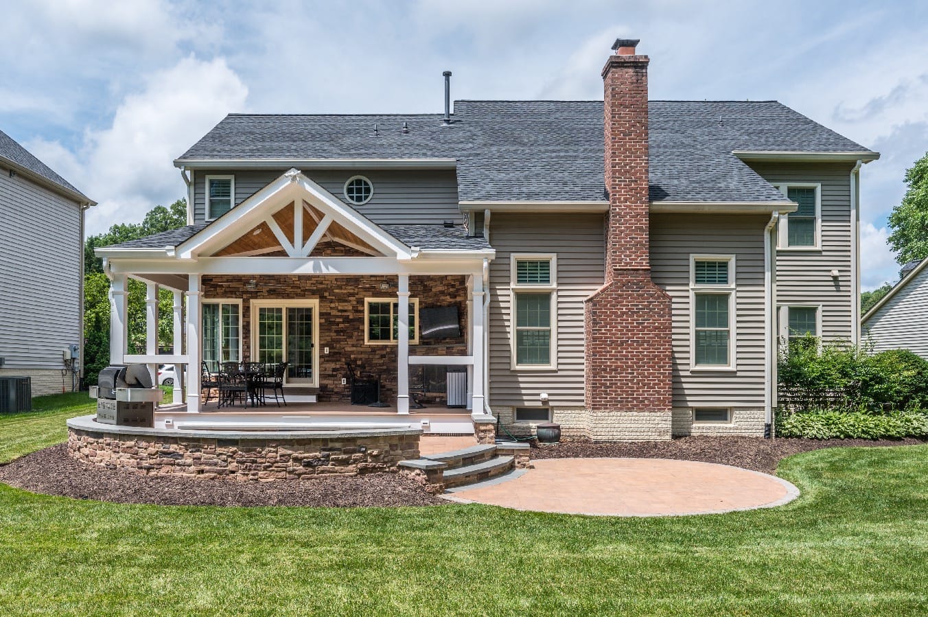 Patio addition with grilling area for outdoor living in Springfield