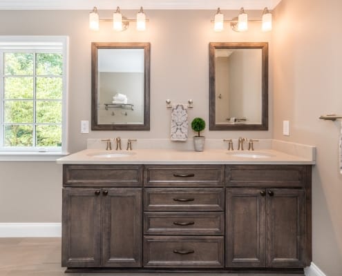 Traditional remodel primary suite Alexandria VA with Koch cabinets and Moen Dartmoor faucets
