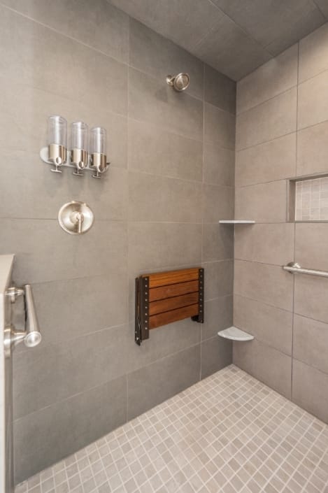 Alexandria, VA shower bathroom remodel foldable bench seat with grab bar for aging in place