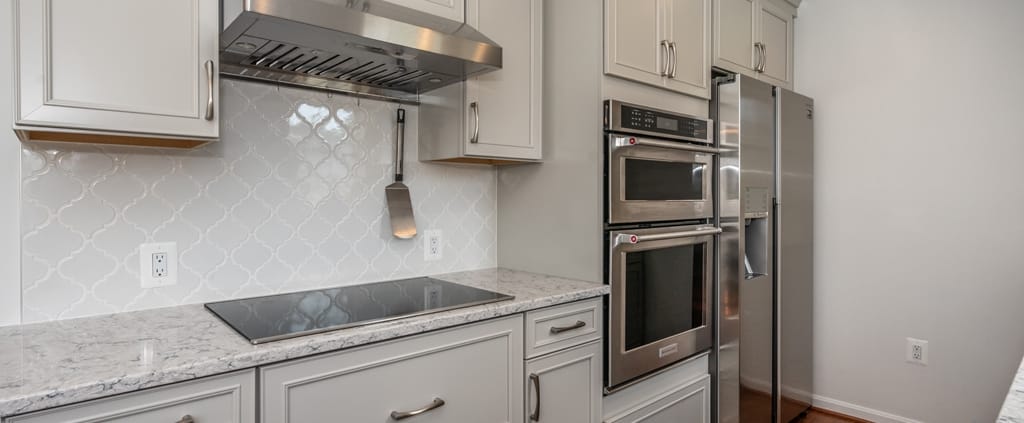 Kitchen remodel, galley style, Alexandria, VA with Waypoint cabinets, Top Knob hardware and Silestone countertops