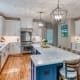 Custom kitchen remodeling by Foster Remodeling, Vienna, VA, large kitchen with custom island and light fixtures