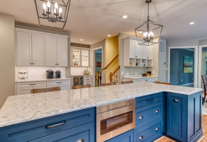 Vienna, VA, custom kitchen remodel with nautical blue Crystal cabinets and geometric light fixtures
