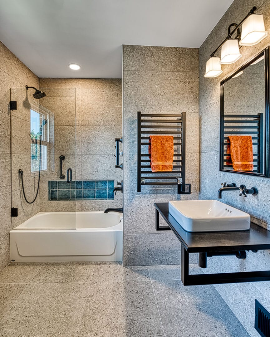 Arlington Bath remodel Industrial chic with metal features and stone walls