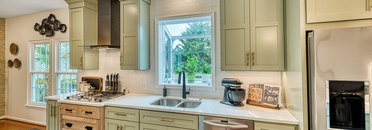 Gainesville Rustic kitchen remodel with bay window and custom stovetop cabinet