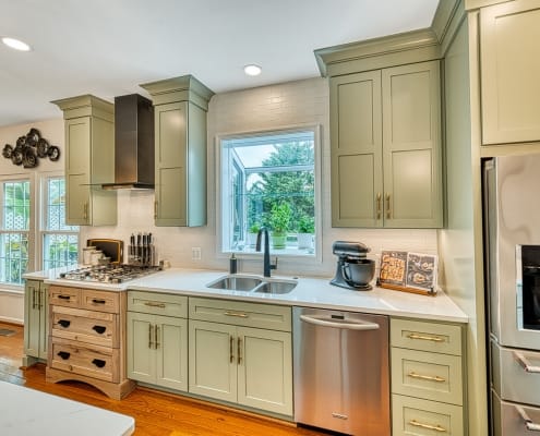 Gainesville Rustic kitchen remodel with bay window and custom stovetop cabinet