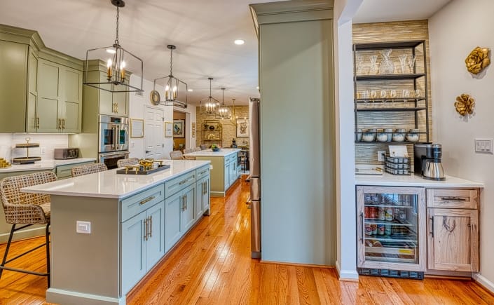 Gainesville kitchen remodel featuring beverage bar and double islands