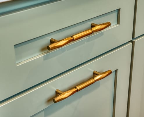 Gainesville kitchen remodel close up of cabinet drawer with gold drawer pulls