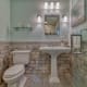 Falls Church bathroom remodel with Carrara marble chair rail and flooring