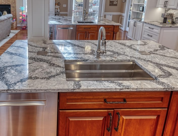 Haymarket, VA custom kitchen remodel with under mount sink, quartz countertops, and raise-up outlets