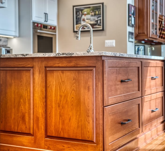 Kitchen remodel Haymarket cherry cabinets, quartz countertops, Amerock Lattice drawer pulls