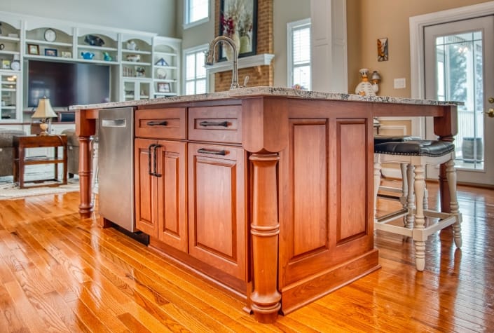 Haymarket, custom kitchen remodel with island in Cherry cabinets with cinnamon stain and Amerock Lattice drawer pulls