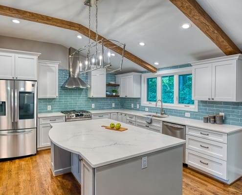 Falls Church Whole Home Remodel - Kitchen with island and ceiling beams