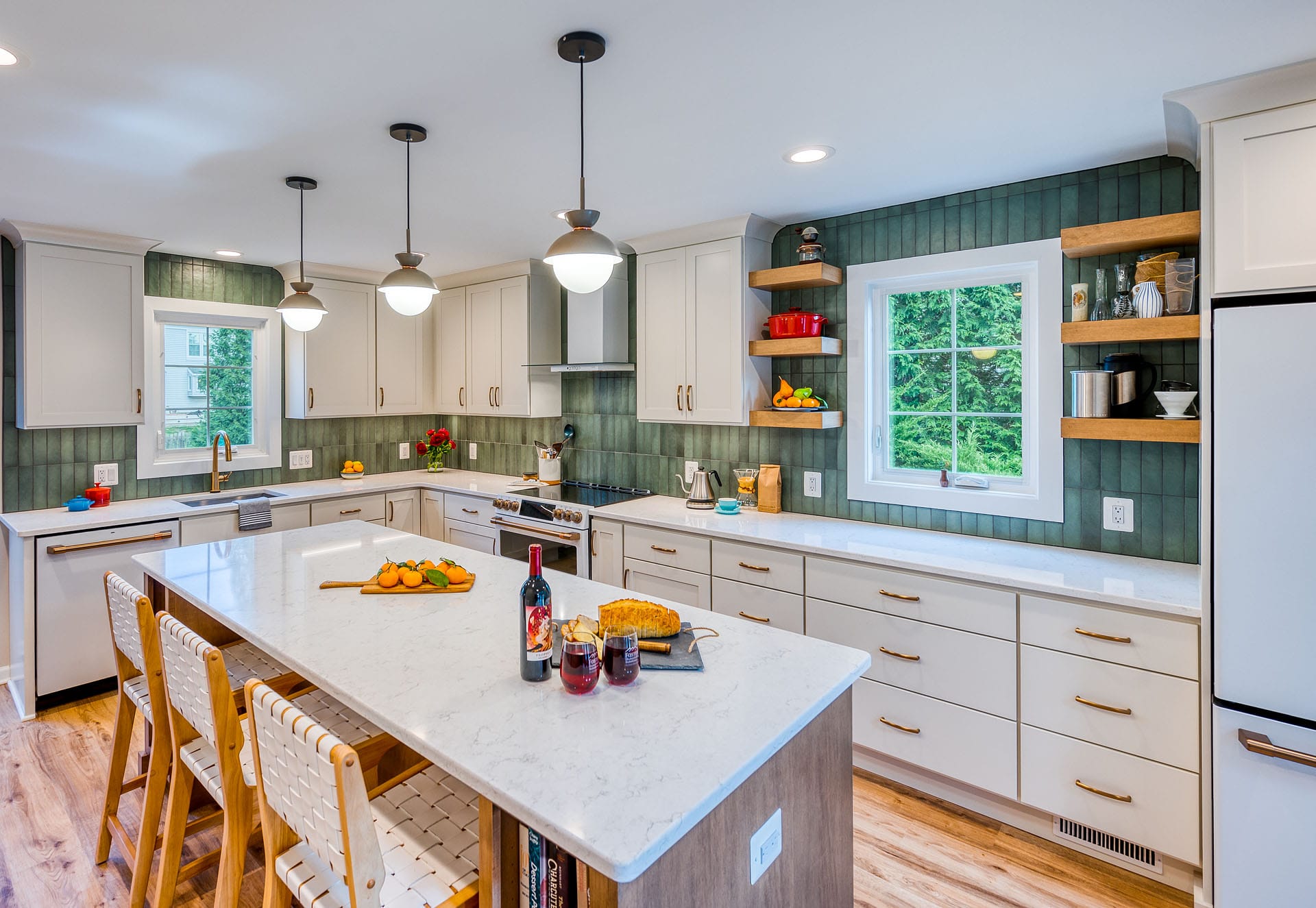 Fairfax, VA kitchen remodel with Shaker style cabinets accented with brushed bronze cabinet pulls an open shelving