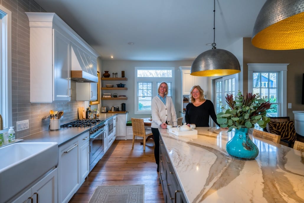 Alexandria custom kitchen remodel by Foster Remodeling featuring photo of designer Rachel De For and homeowner.