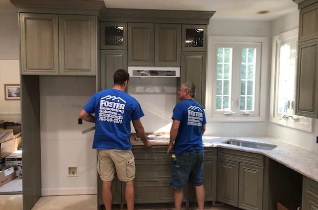 Foster remodeling carpenters working on kitchen remodel