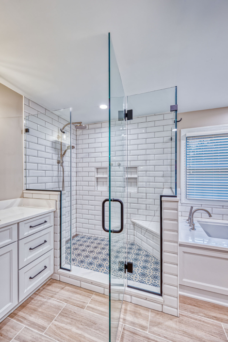 walk in shower stall with glass walls and white subway tiles custom pattern tile shower floor