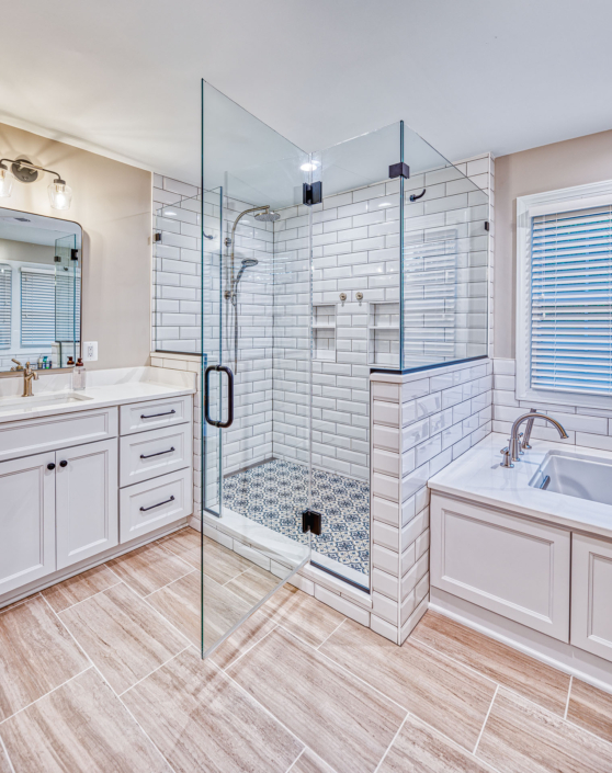 newly remodeled bathroom with large walk in shower and glass door