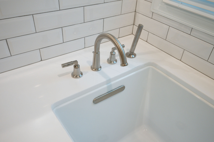 close up photo of tub fixtures