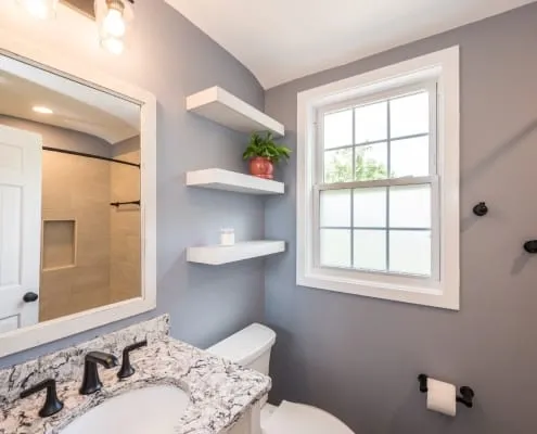 Arlington cozy bath remodel with floating shelves 