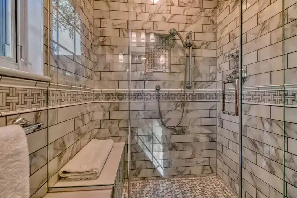 bathroom remodel with stone colored tiles