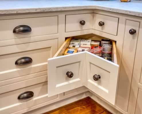 Kitchen remodel with custom Crystal Keyline cabinets featuring a "corner" drawer for space saving.